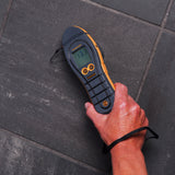 Protimeter Surveymaster Moisture Meter measuring moisture in tiles